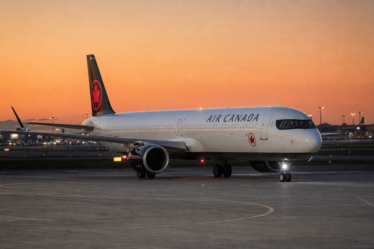 Airbus A321XLR preparing for takeoff at a major airport at dusk