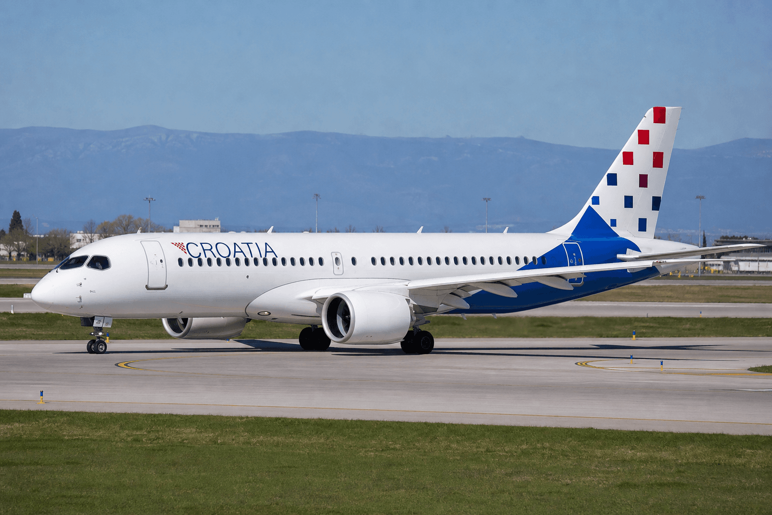 Airbus A220 taxiing at an airport in Croatia under overcast skies