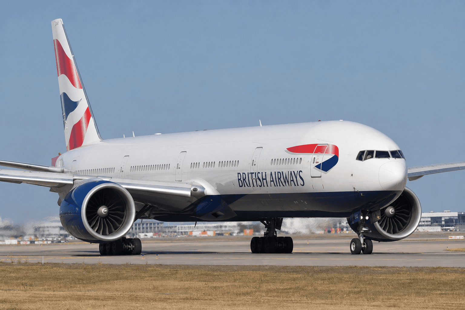 Boeing 777-300ER taxiing on runway during daytime