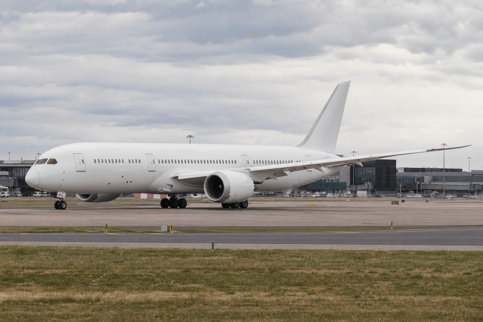 Boeing 787 Dreamliner taxiing at an airport during daytime