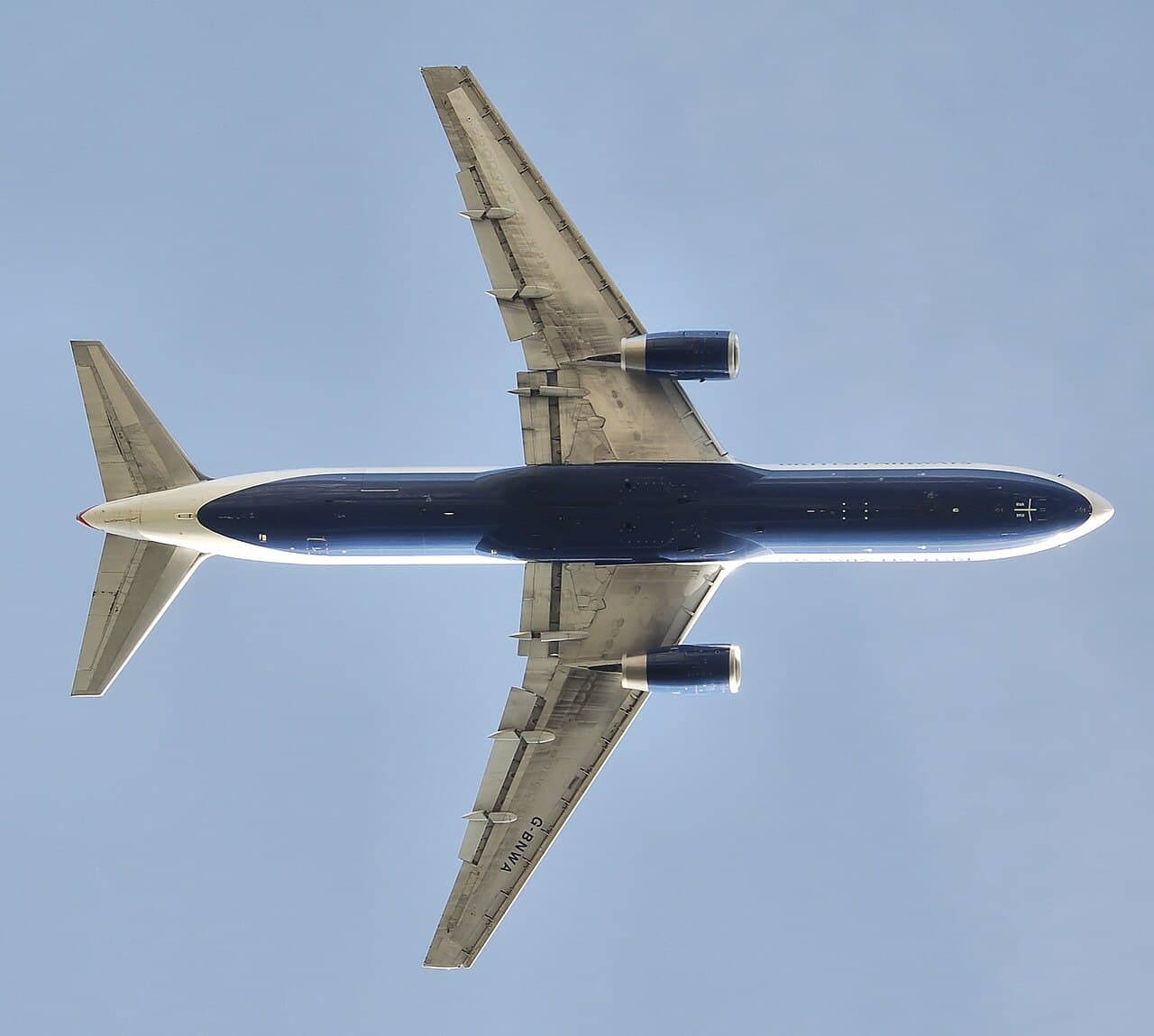 ANA Boeing 767 on final approach at Tokyo Haneda Airport at dawn