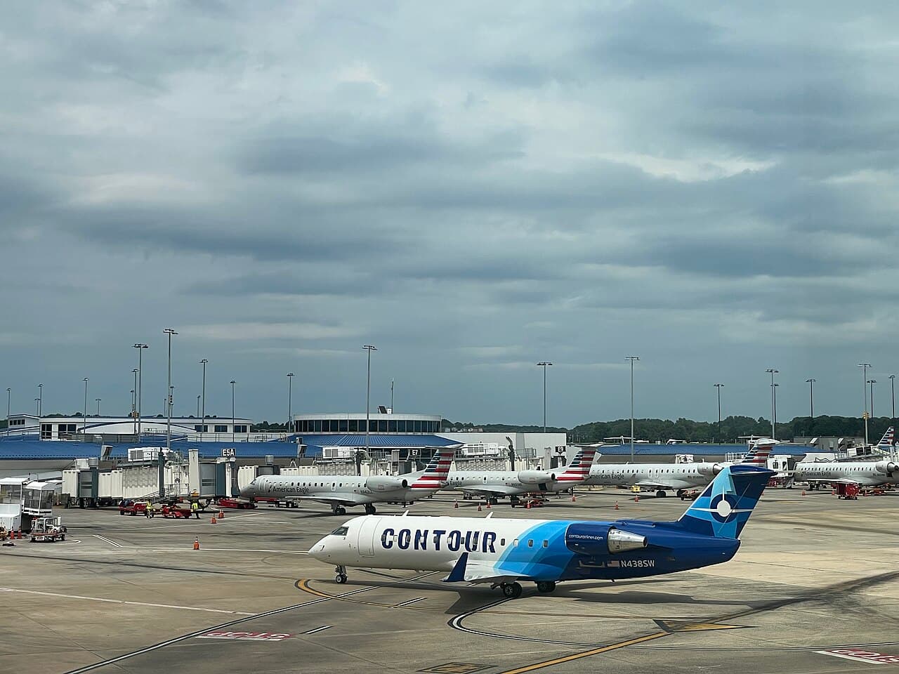 Contour Airlines regional jet parked at a Midwestern airport under clear skies