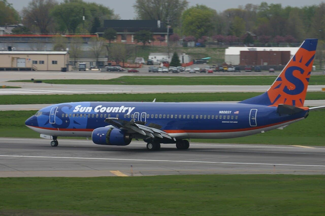 Sun Country Boeing 737 freighter taxiing at Minneapolis-St. Paul airport on a cloudy day
