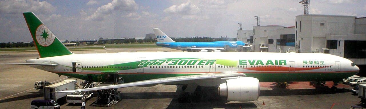 An EVA Air aircraft taxiing at Washington Dulles International Airport on a clear day