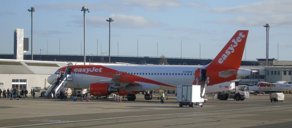 easyJet Airbus A320 taxiing at London Gatwick Airport on a bright day